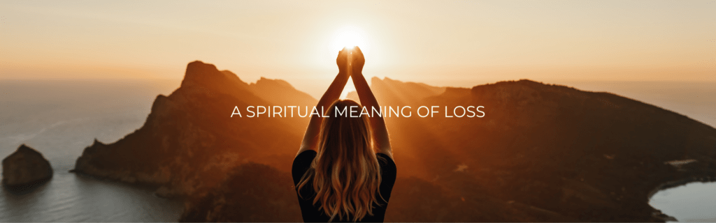 A woman looking at loss from a spiritual perspective after divorce