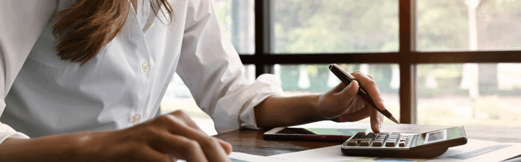 Woman organizing her finances after divorce. 